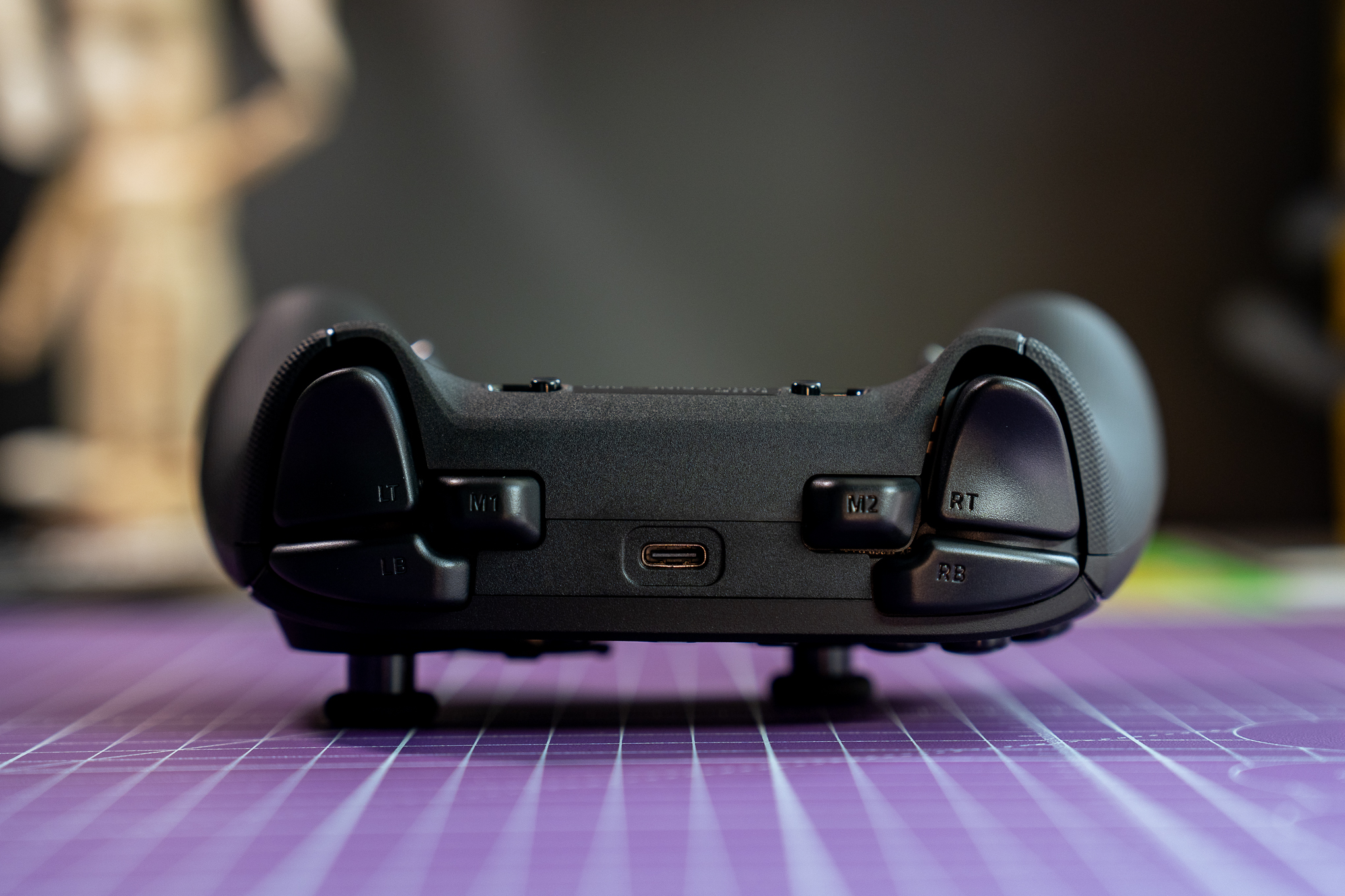 It’s not every day you see six buttons on top of a controller.