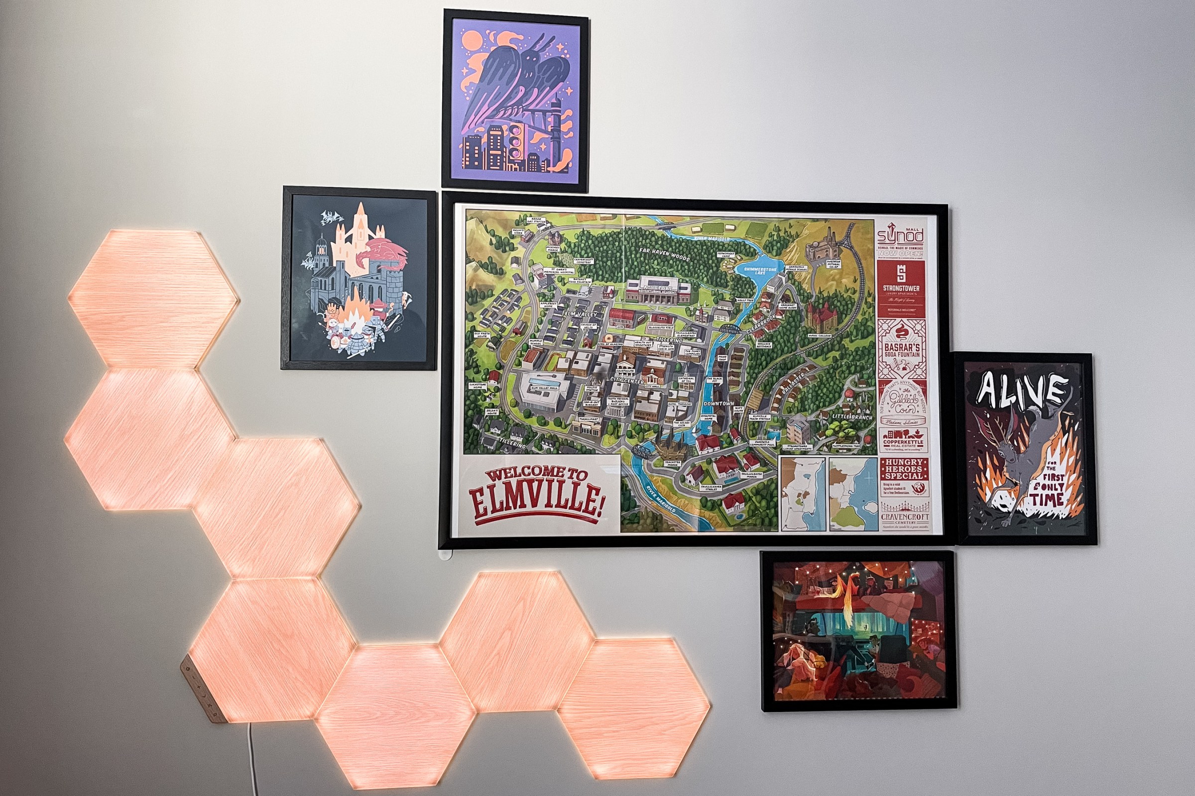 A map labeled Welcome to Elmville surrounded by other pictures.