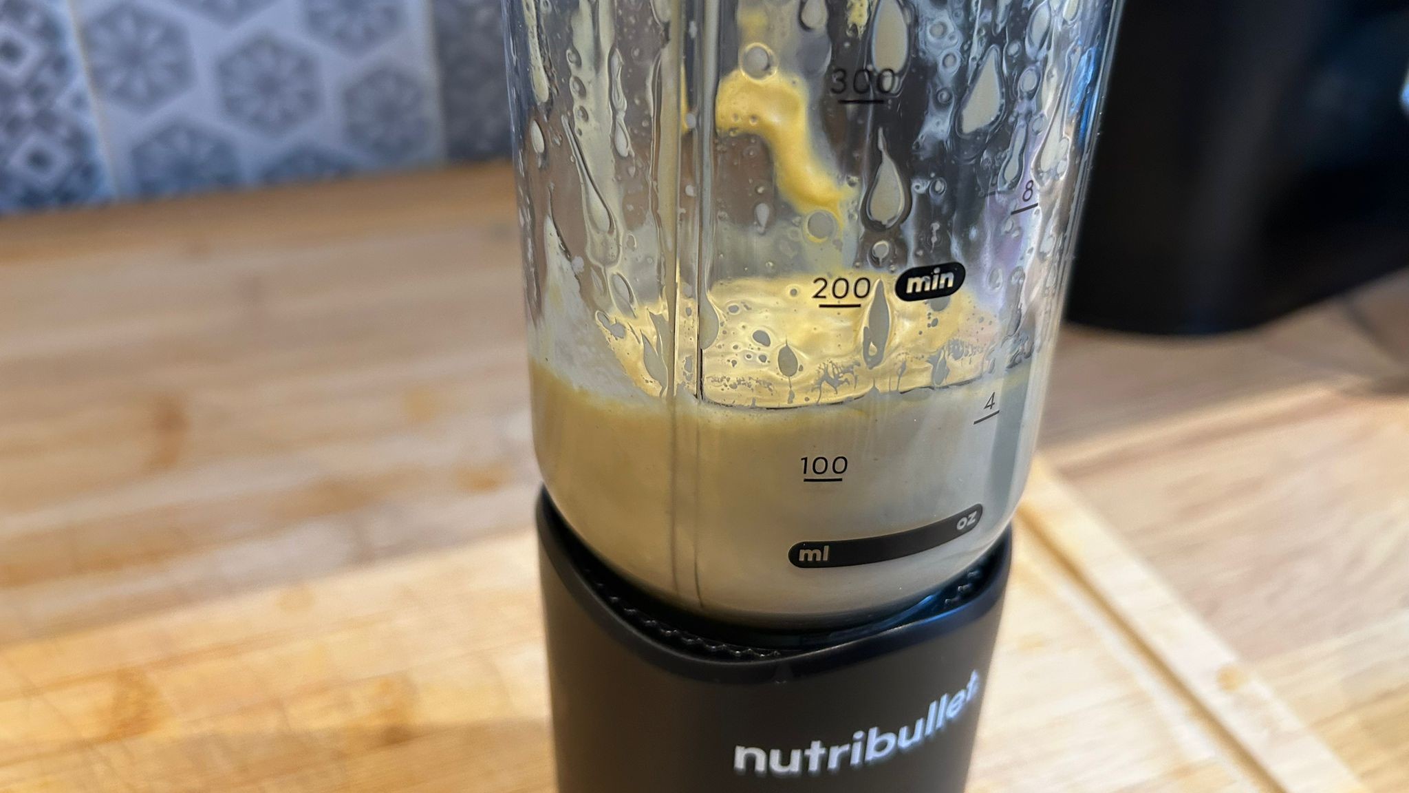 Nutribullet Flex blender containing blended mayonnaise
