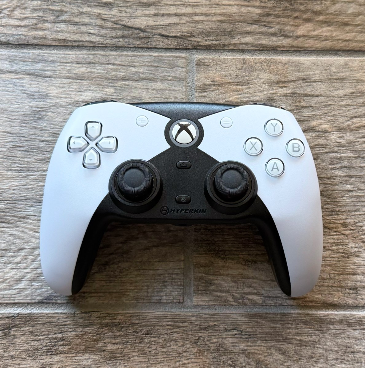 Hyperkin’s Competitor Xbox controller on a gray background.
