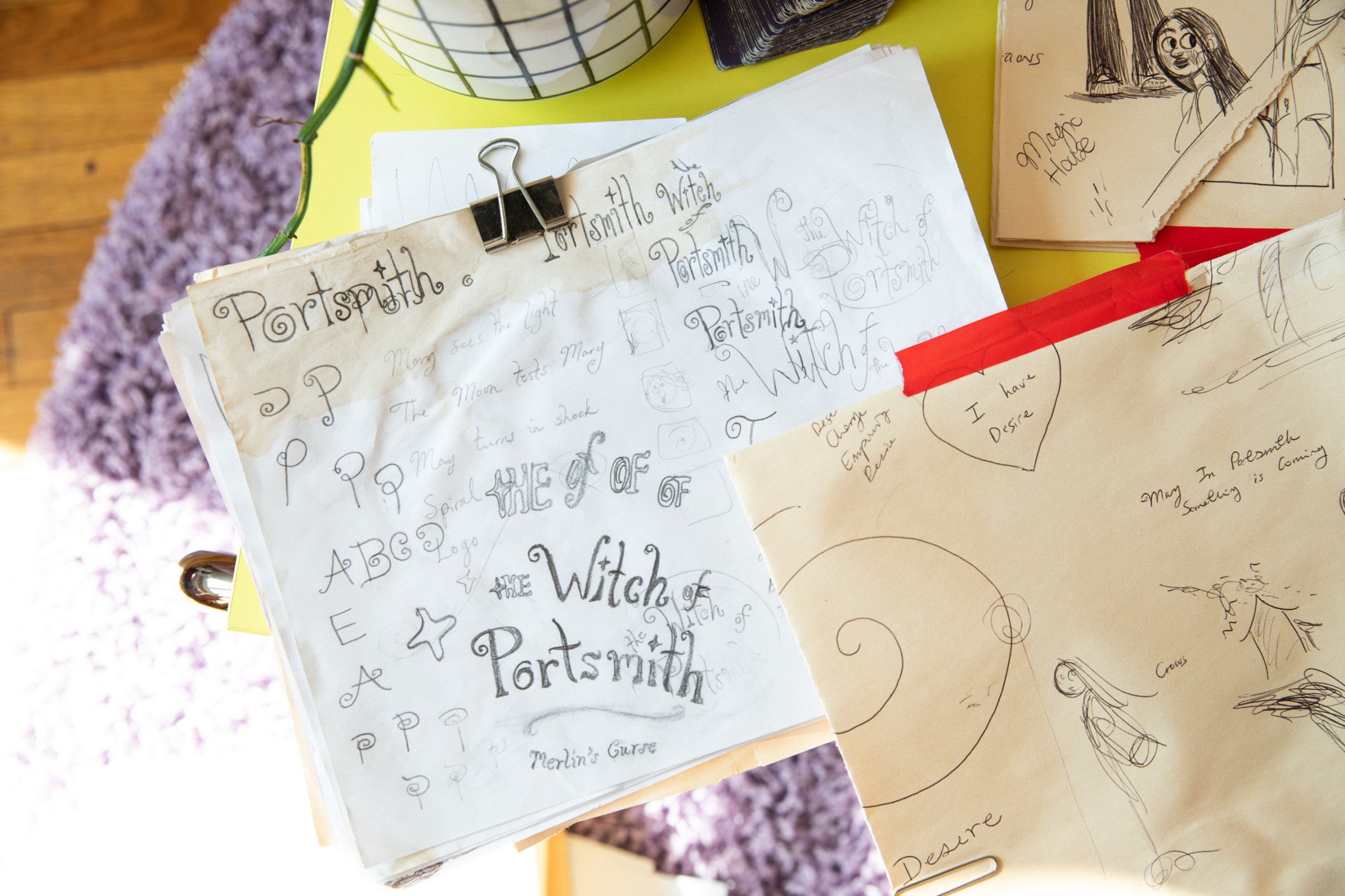 O’Donnell’s sketchbook page is open on a table.