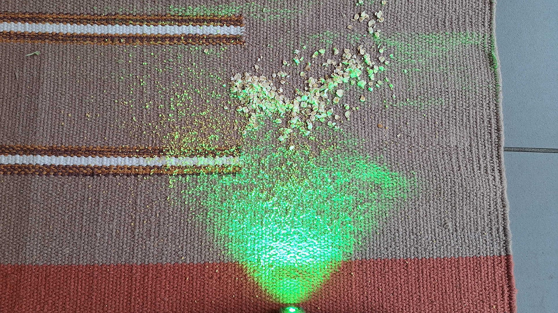 Dyson PencilVac being used on a canvas mat