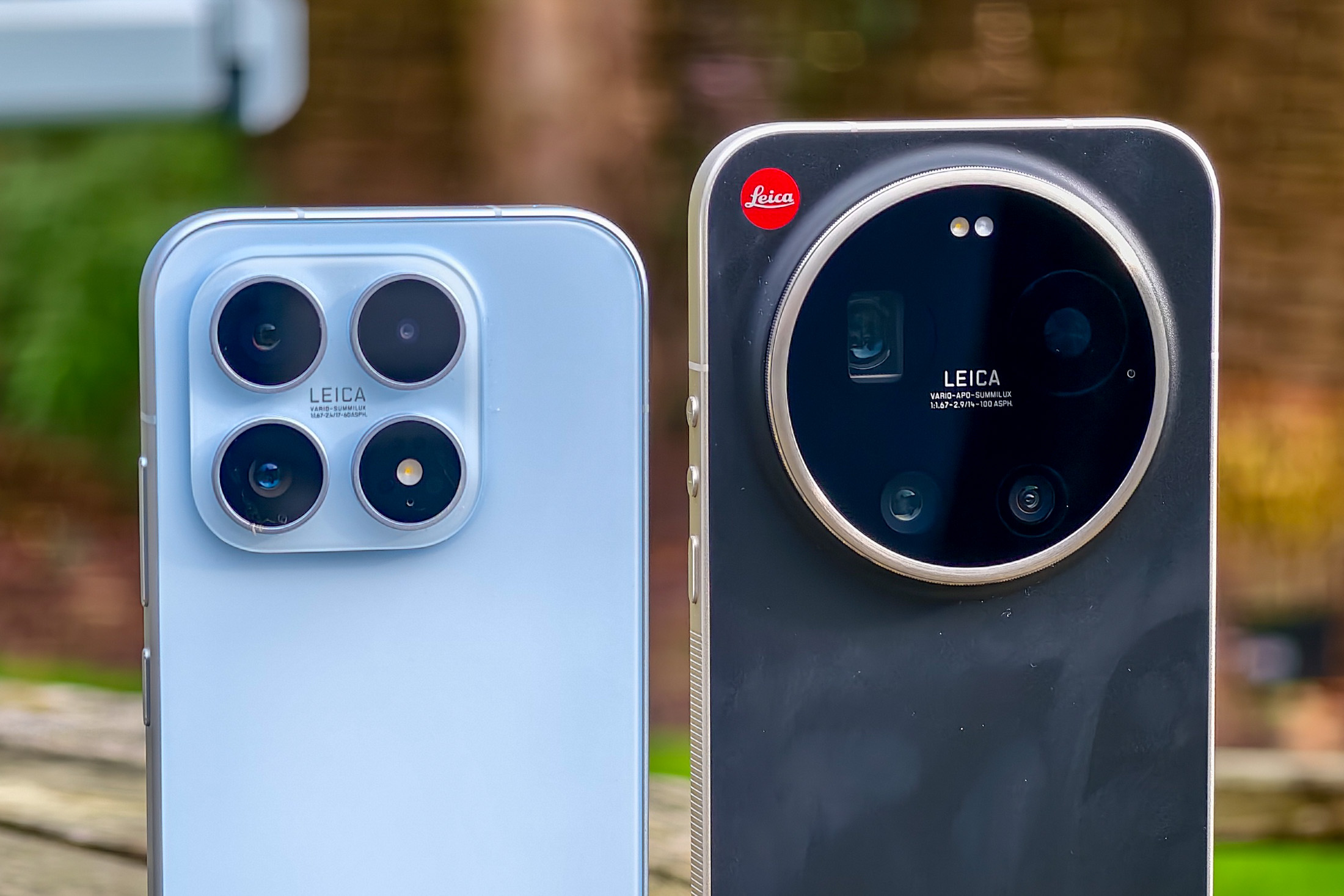 Photo of Xiaomi 17 and 17 Ultra on a table, closeup on the cameras