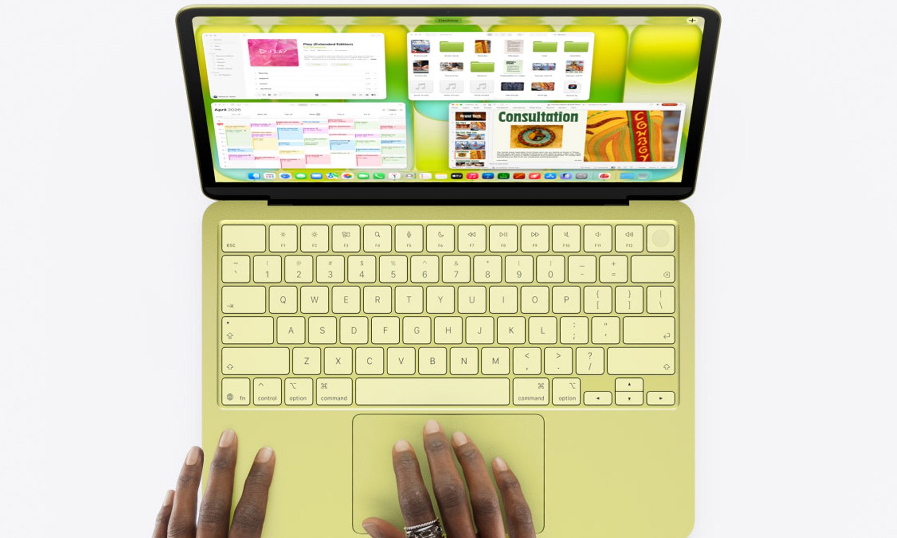 Apple MacBook Neo with users hands on it