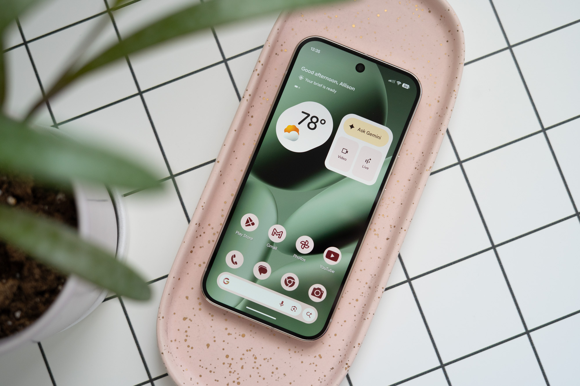 Google Pixel 10 Pro on a desk showing home screen