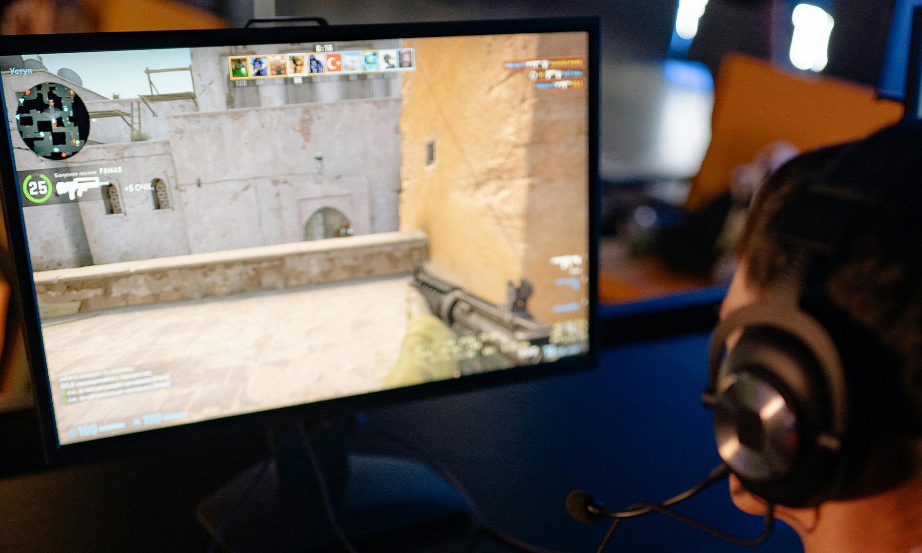 Man playing Counter Strike on PC Monitor Gaming