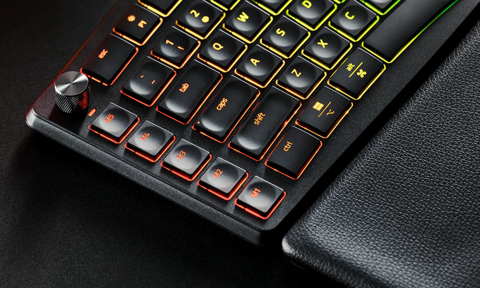 Razer Pro Type Ergo keyboard with dial at the top left.