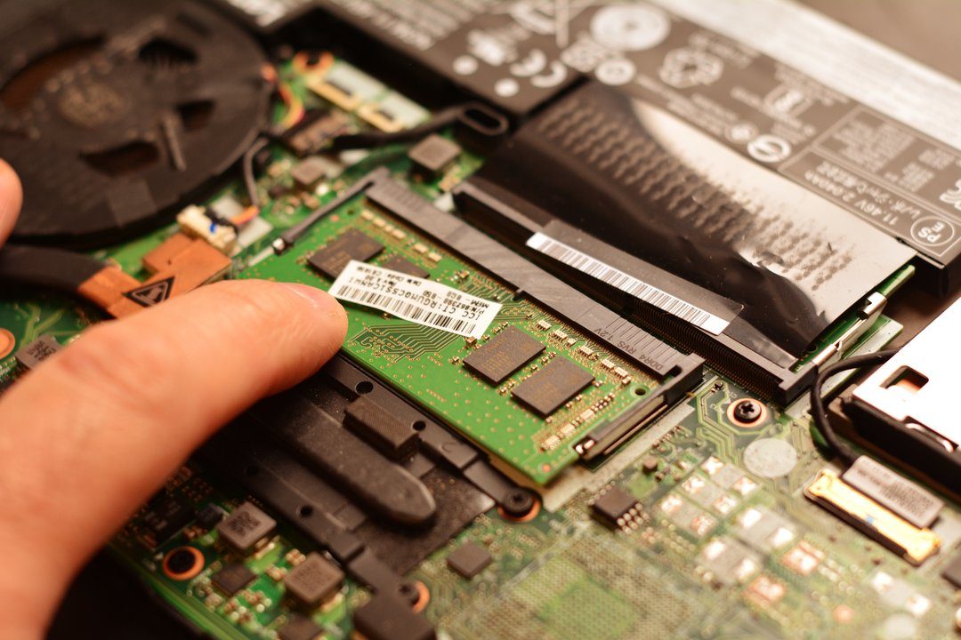 Secure RAM on laptop motherboard