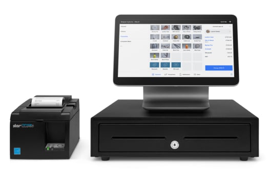 Square point-of-sale system with touchscreen display, receipt printer, and cash drawer for retail and restaurant businesses.
