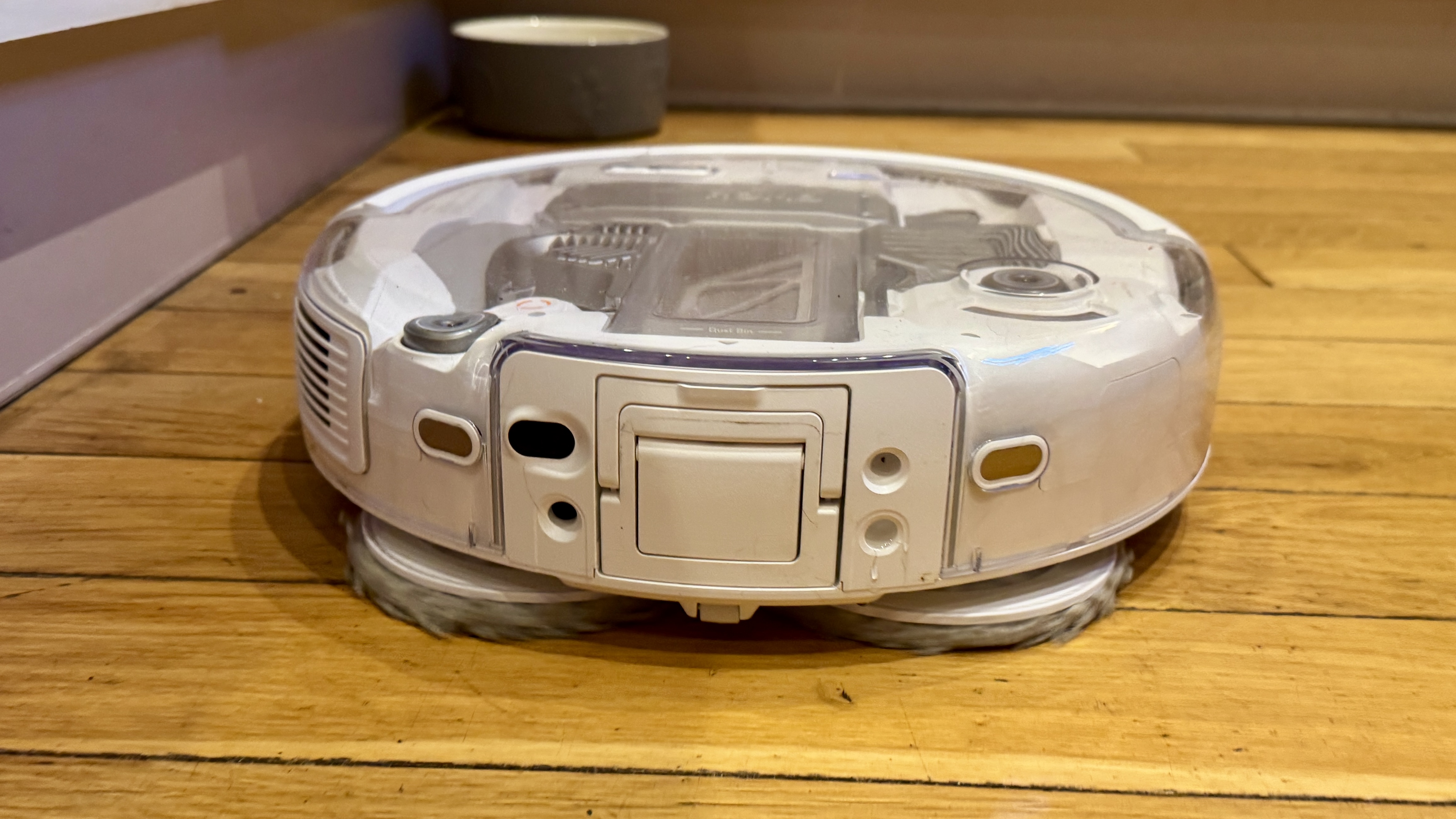 DJI Romo P robot vacuum mopping a hard floor