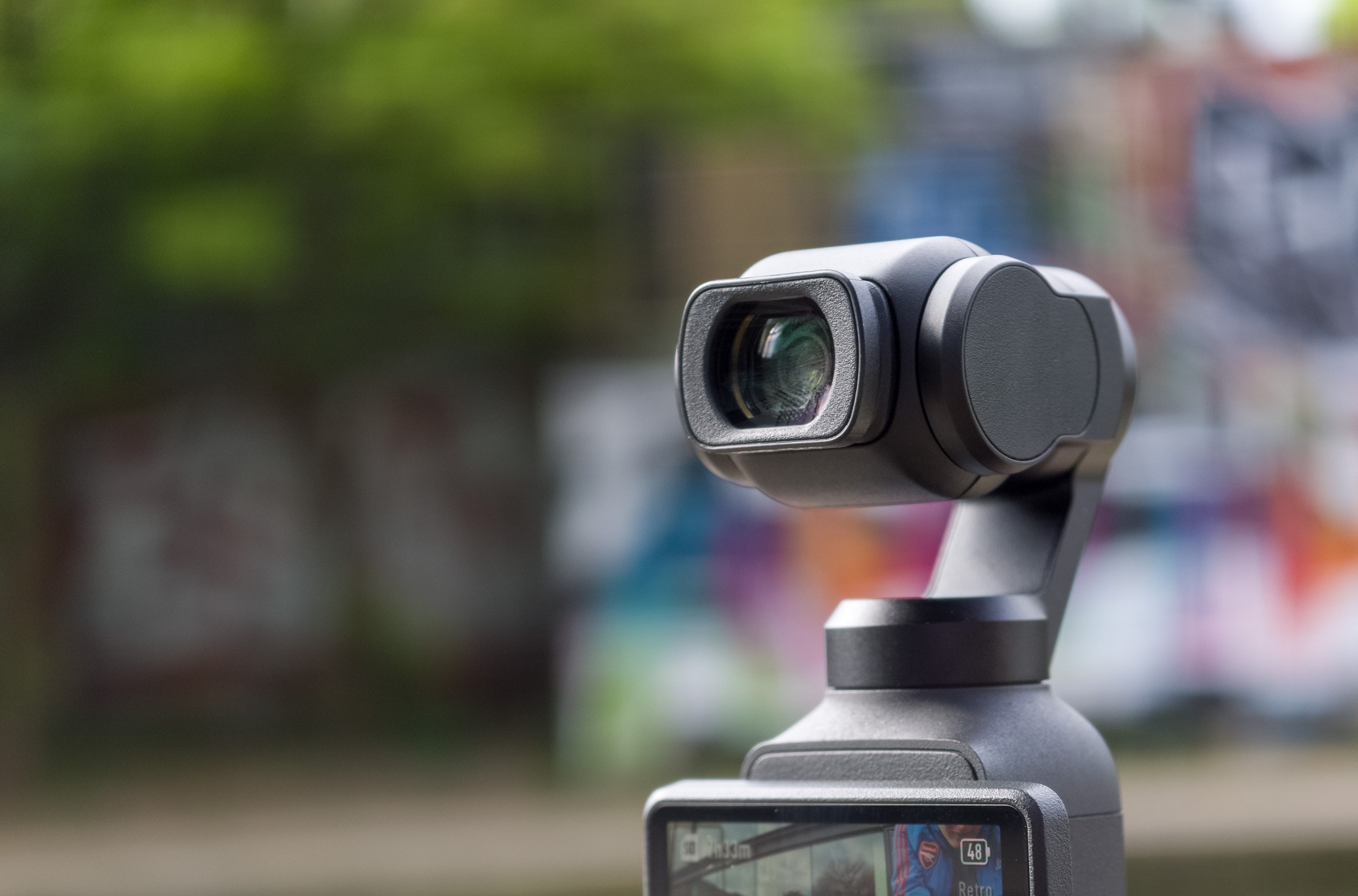 Photo of the DJI Osmo Pocket 4 camera with a wide-angle lens