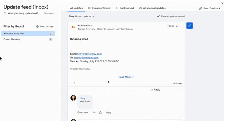 monday.com update feed showing recent activity, filters by board, an automation notification, and threaded comments