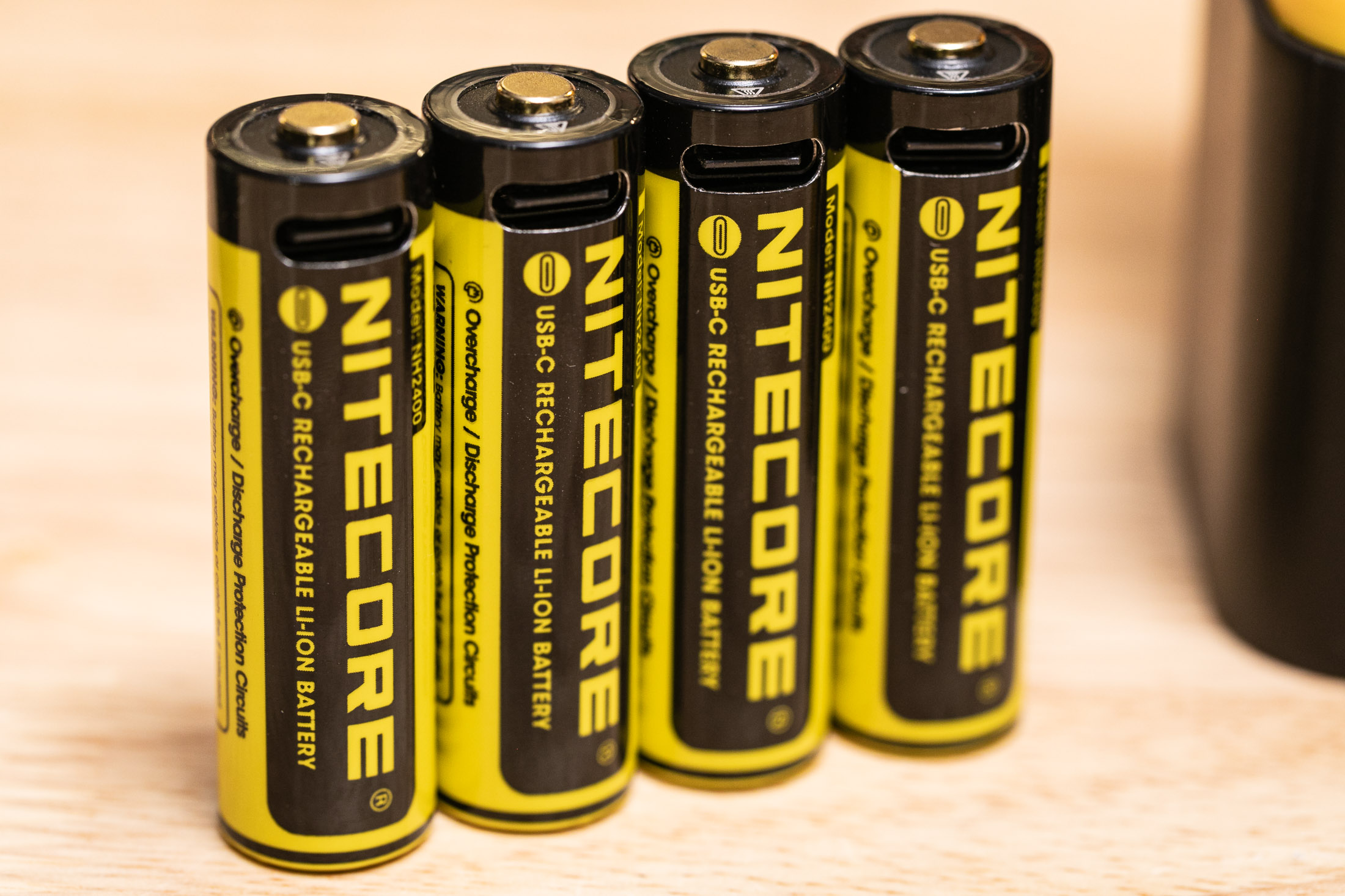 I wish Nitecore had better quality control! Among other things, the second battery from the left has a crooked button top; another four-pack I bought had the same problem.