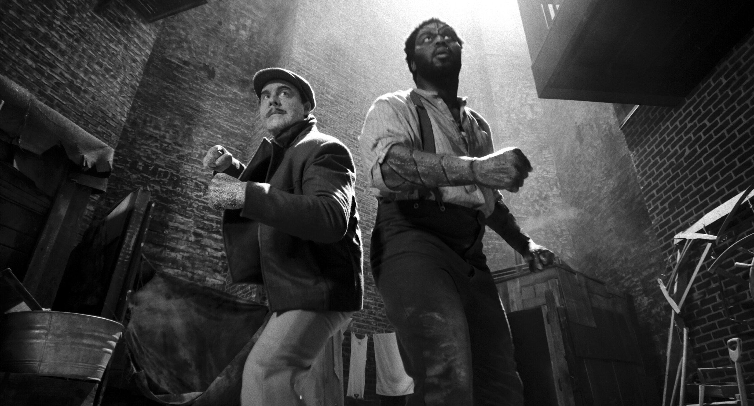 Flint Marco/Sandman (Jack Huston) and Lonnie/Tombstone (Abraham Popoola) in SPIDER-NOIR.