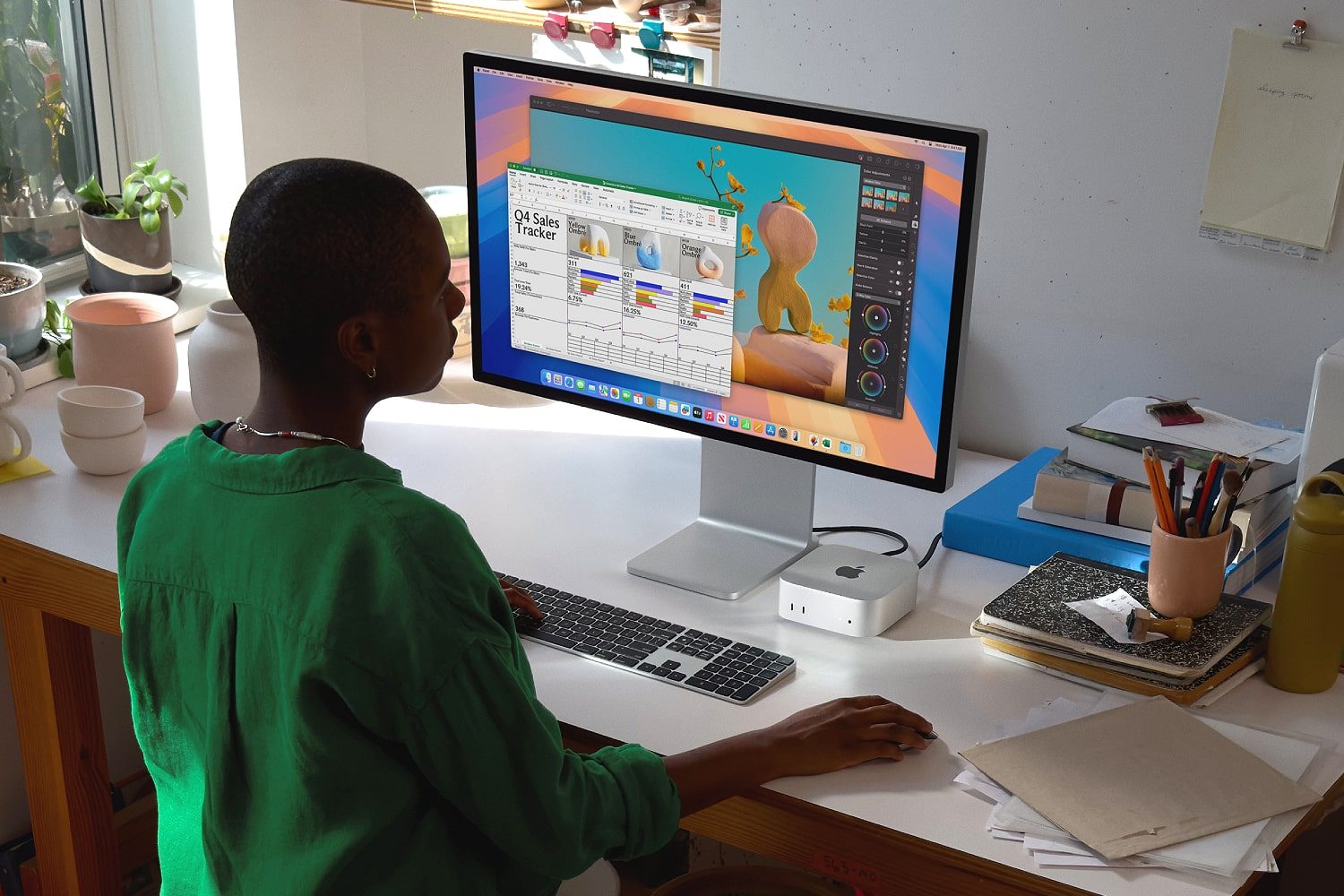 The M4 Mac mini being used in a workplace.