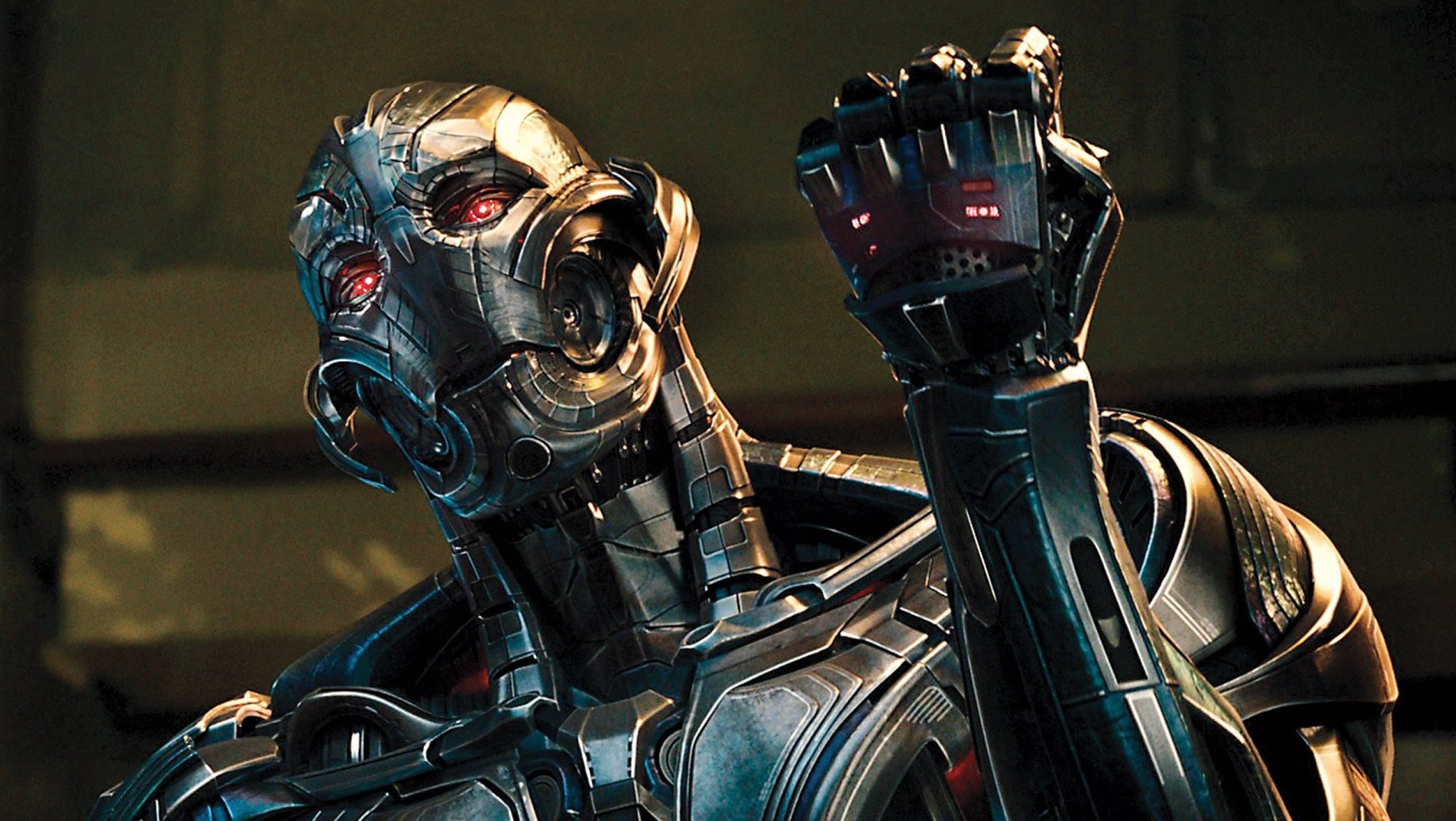 Ultron making a fist and raising it in Avengers: Age of Ultron.