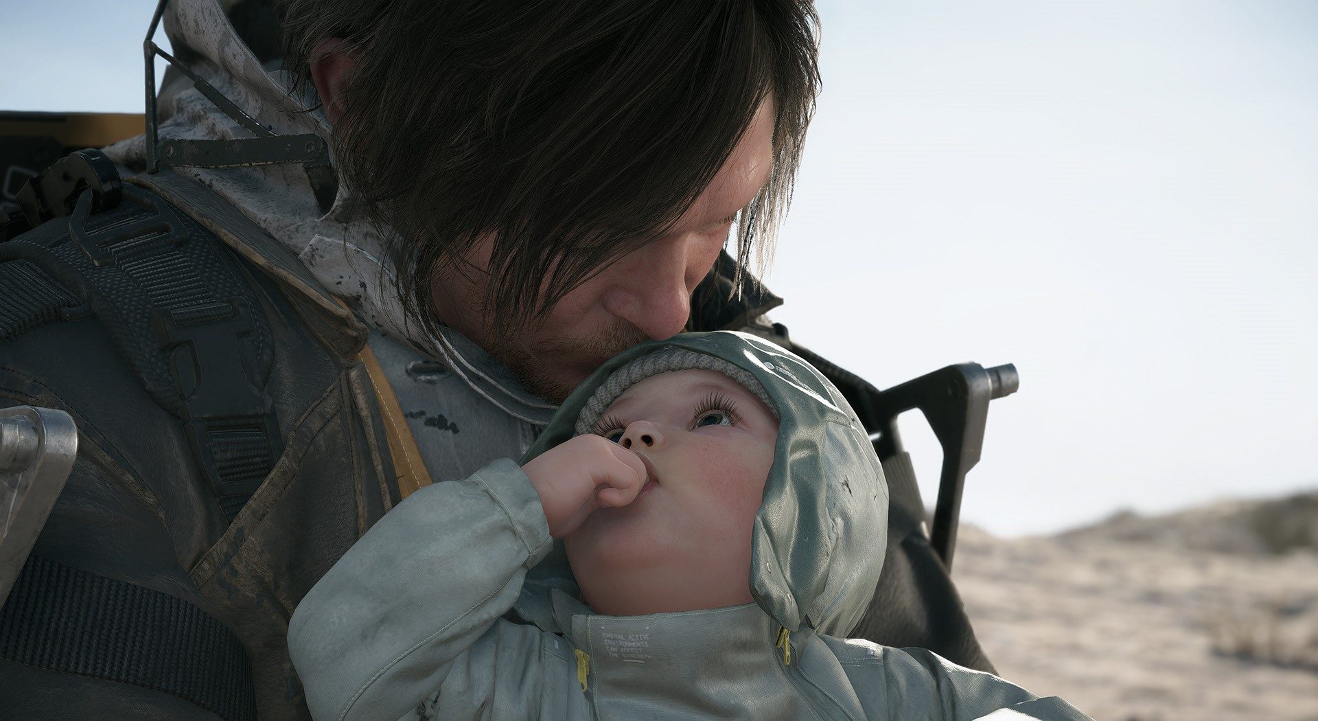 Sam holds Lou in Death Stranding 2: On The Beach.