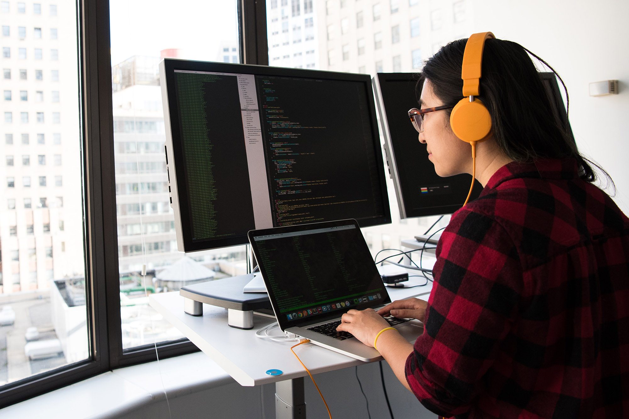 girl coding on computer