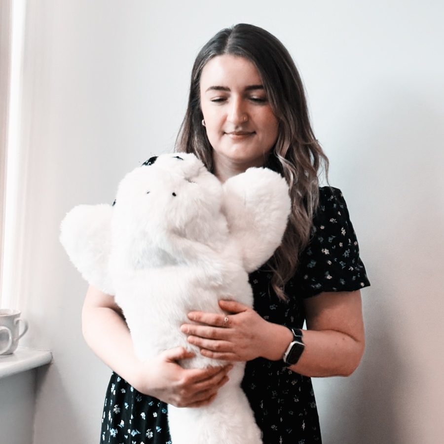 girl holding seal paro