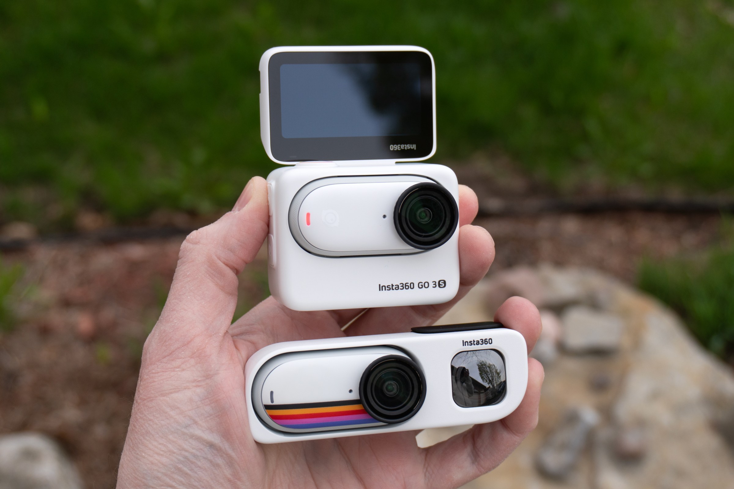 The Insta360 Go 3S in the Retro Viewfinder next to the same camera in the Action Pod accessory.