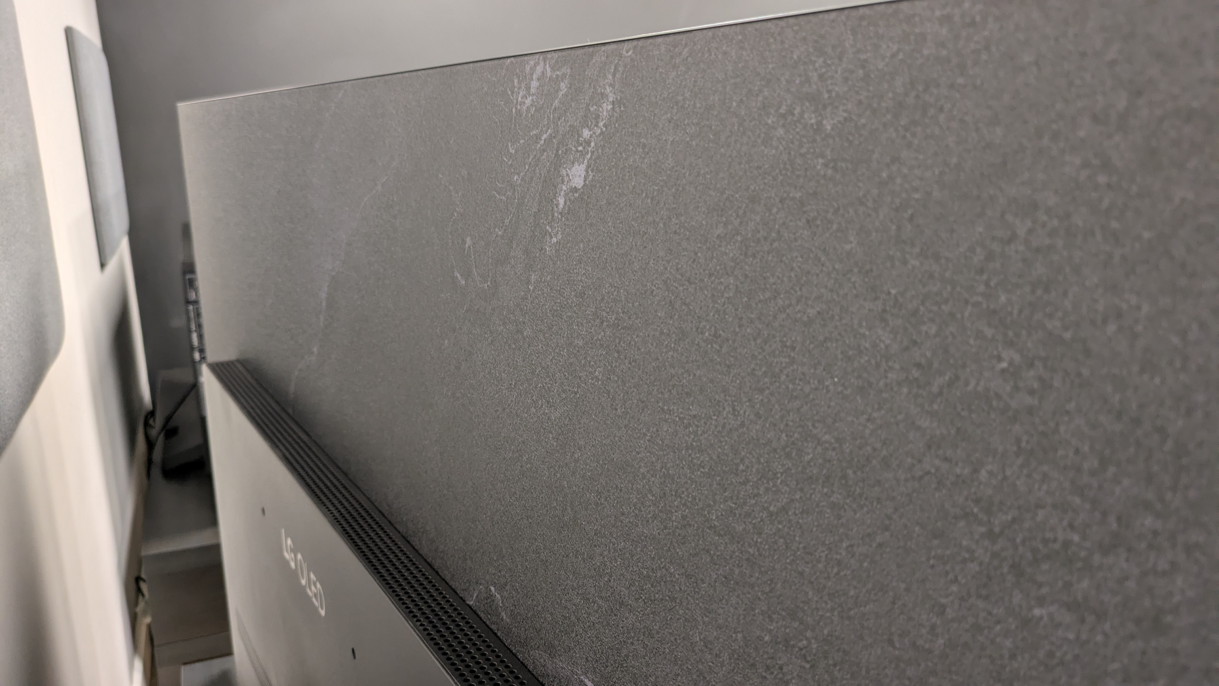 The LG C6 OLED TV's rear panel which has a marble effect to create a premium looking design 