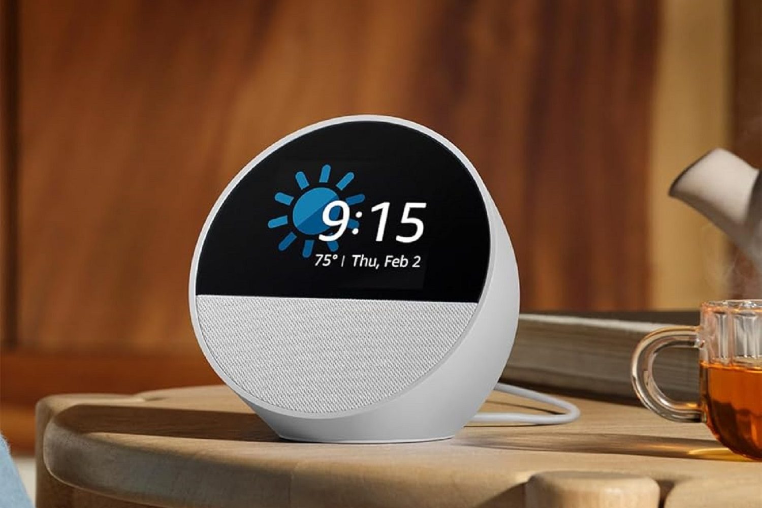 The Amazon Echo Spot 2024 smart alarm clock on a table.