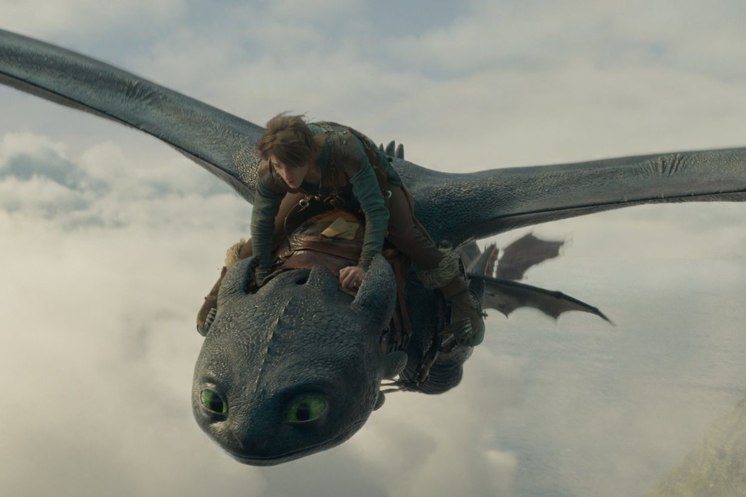 Hiccup rides a dragon in the skies in