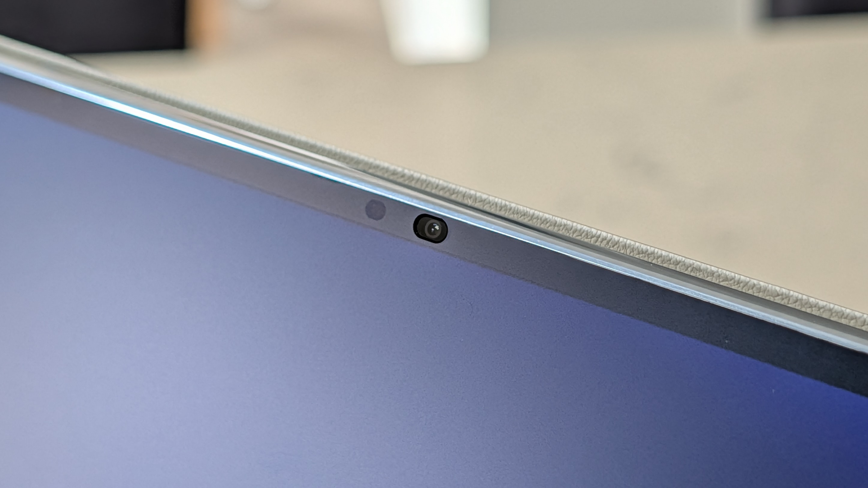Photos of the Huawei MatePad Pro Max resting on a marble table
