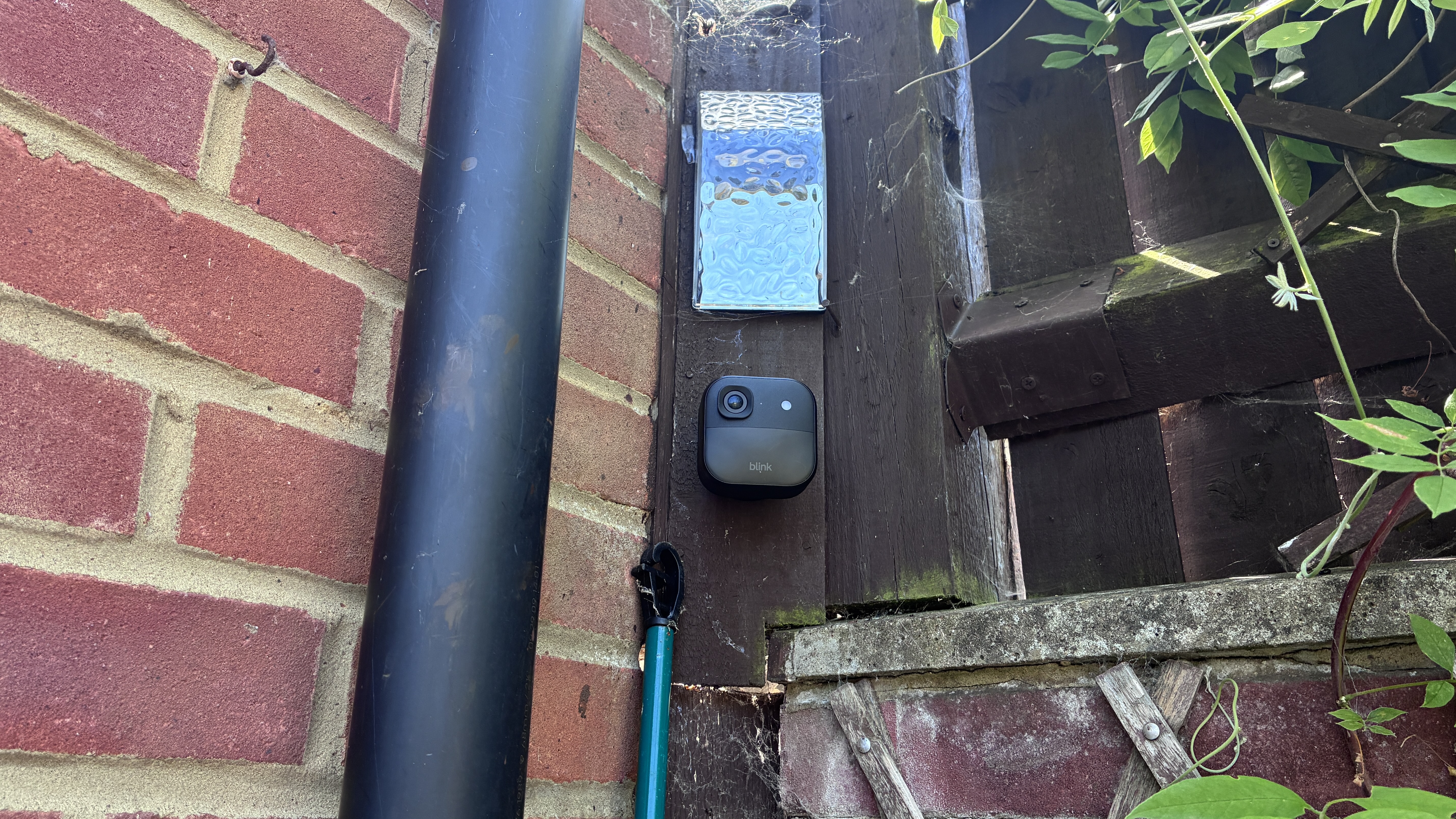 Blink Outdoor 2K+ security camera mounted on wall