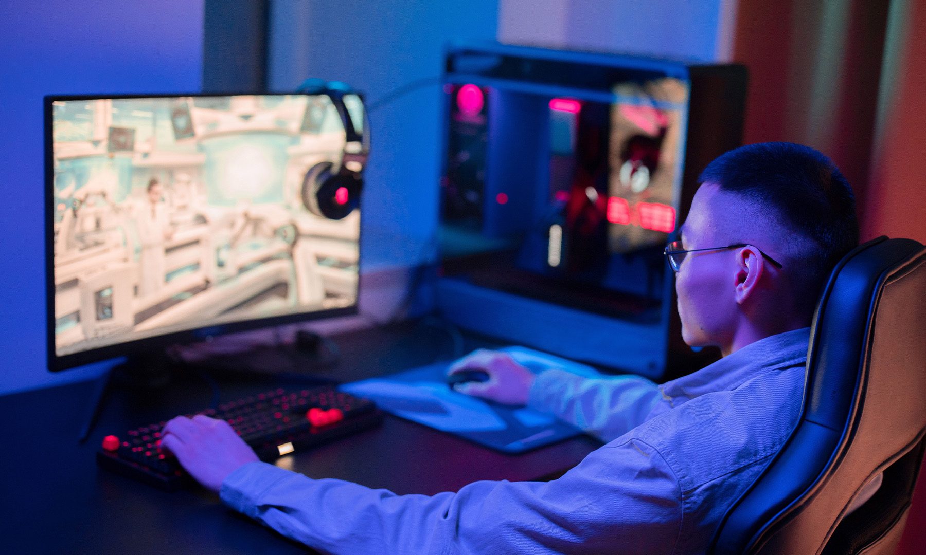 Man gaming on a PC Computer