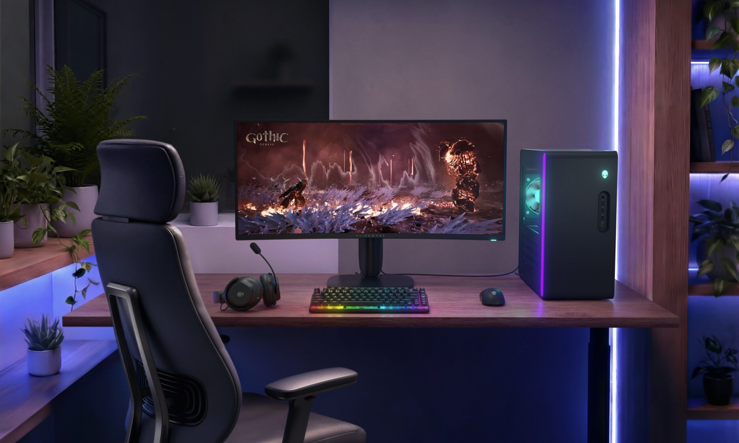 Alienware Ultrawide gaming monitor on a desk with a desktop PC