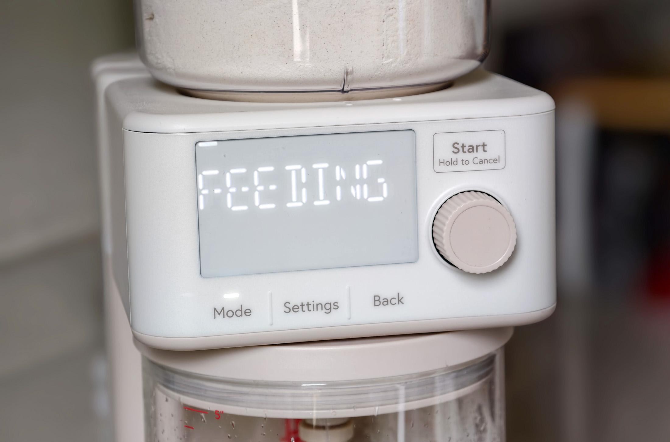 Photo of the Sourdough Sidekick on a kitchen counter saying it is feeding