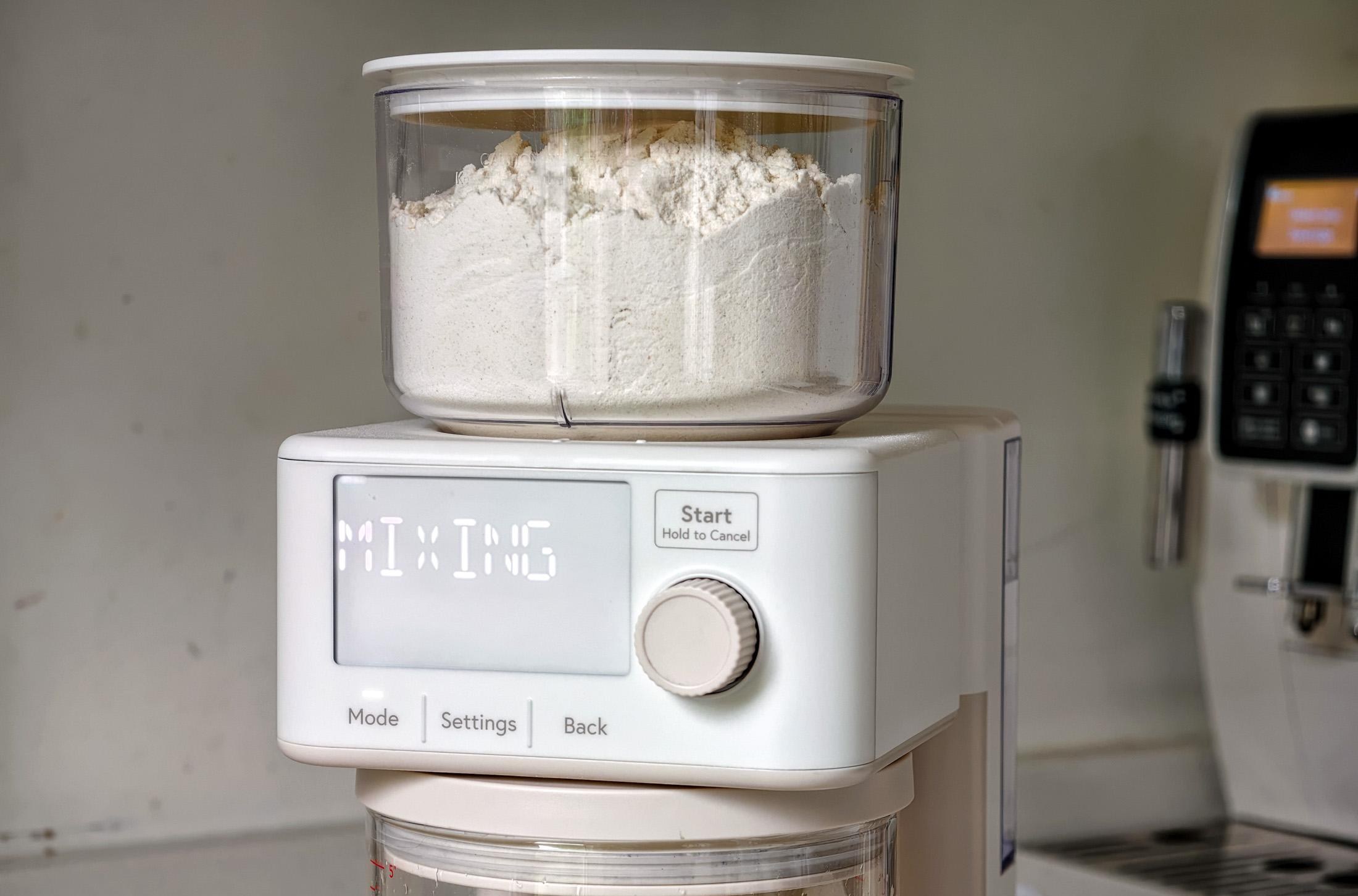 Photo of the Sourdough Sidekick on a kitchen counter showing the flour pot