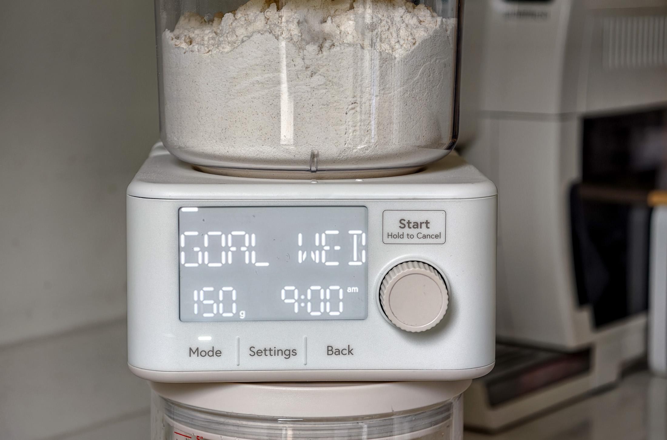 Photo of the Sourdough Sidekick on a kitchen counter showing the goal date and weight on the screen