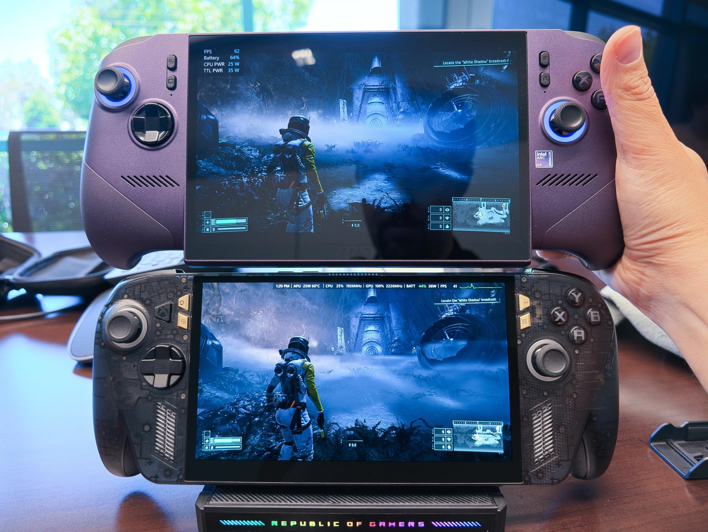 I’m holding the purple Claw above the frosted translucent Ally again, this time with Returnal on the screen, again with lots of reflection of my own face on the Claw but not the Ally.