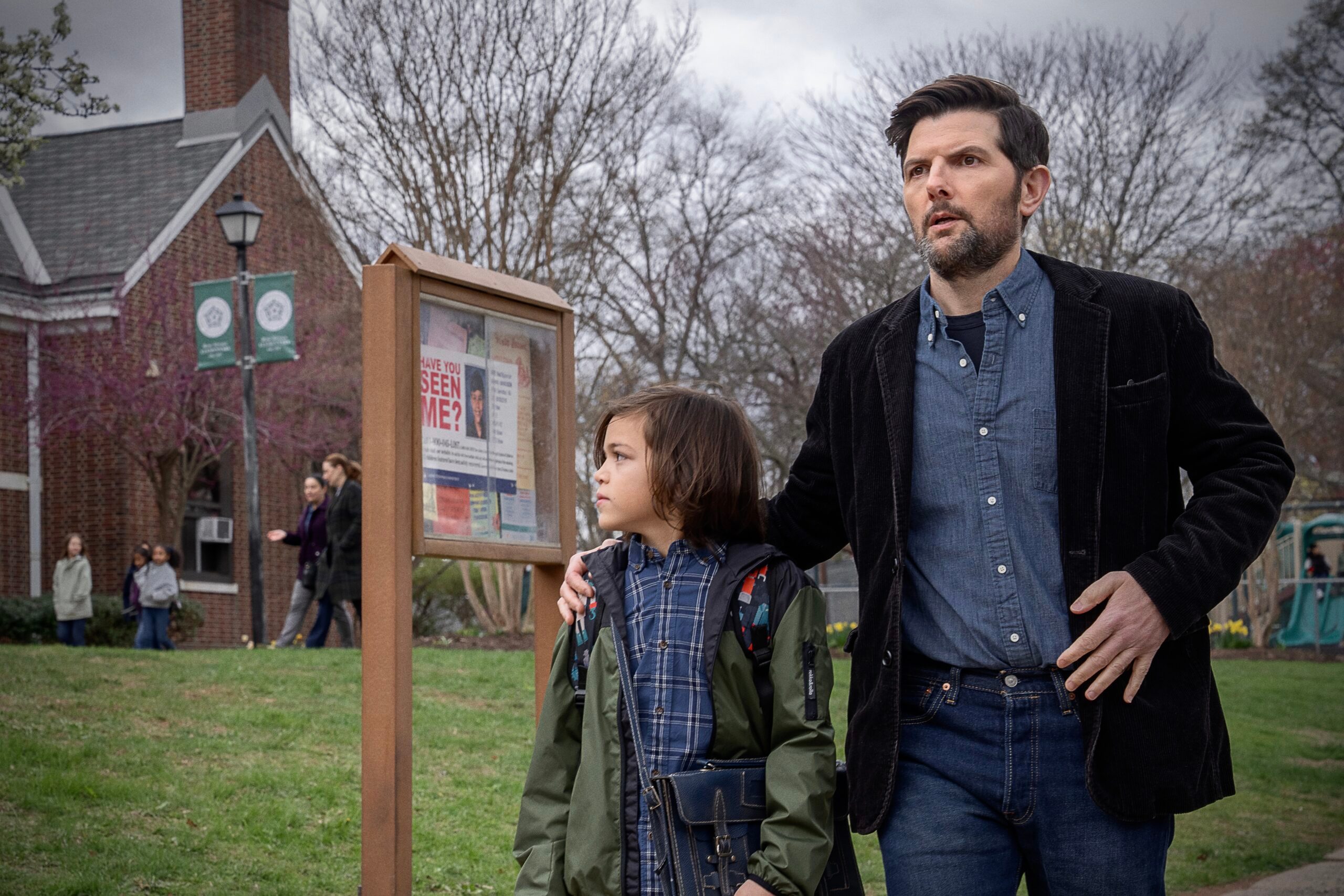(L-R) Acston Luca Porto as Jake Kennedy and Adam Scott as Tom Kennedy in The Whisper Man.
