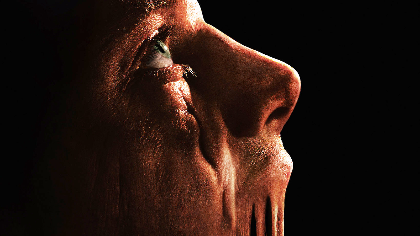 A screenshot of Tom Rhys Harries' Matt Hagen with his face melting in DC Studios' Clayface movie