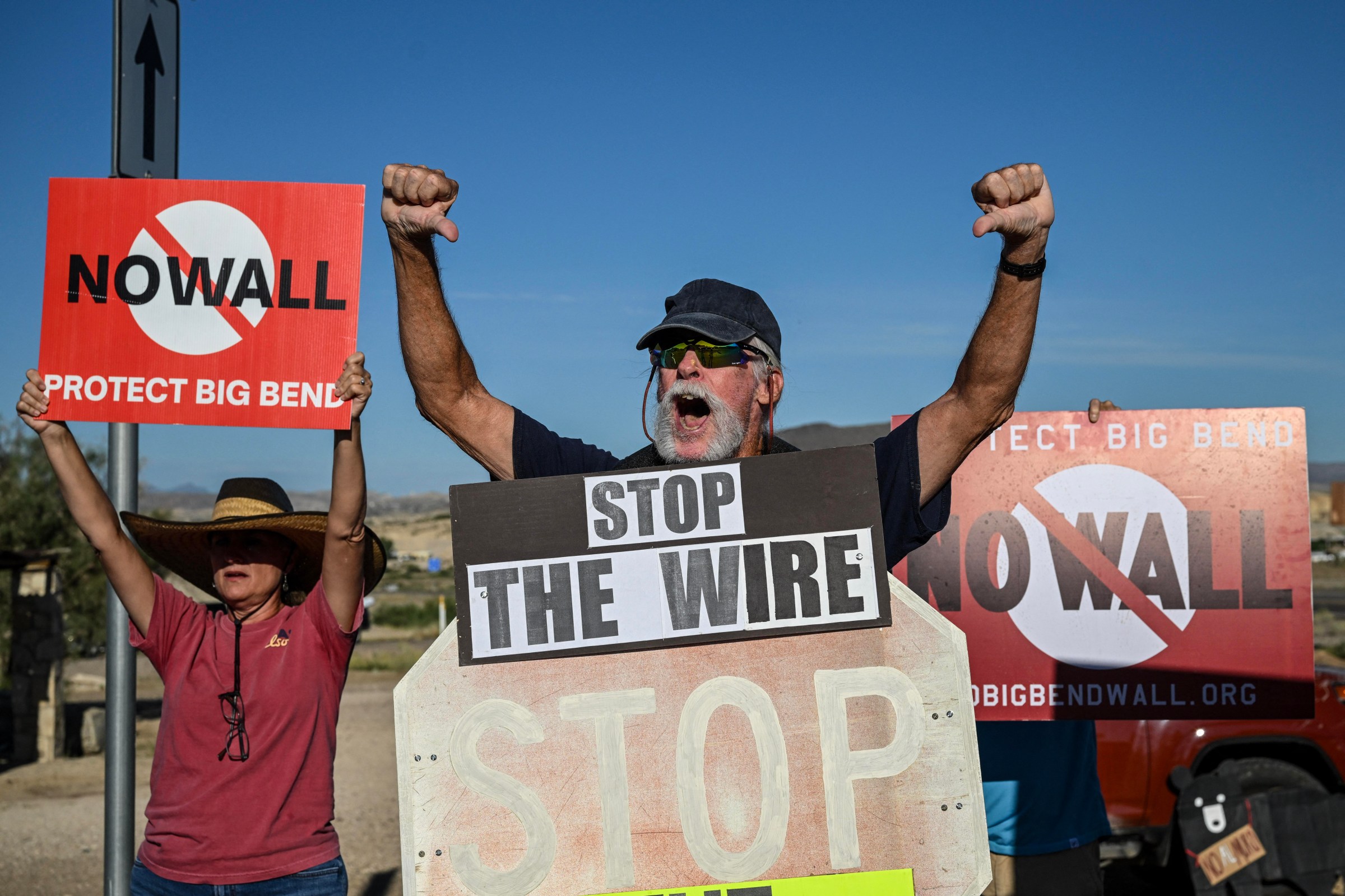 People protest the plans by US President Donald Trump’s administration to build a section of the border wall at the Big Bend National Park in Study Butte, Texas, on August 15, 2026.