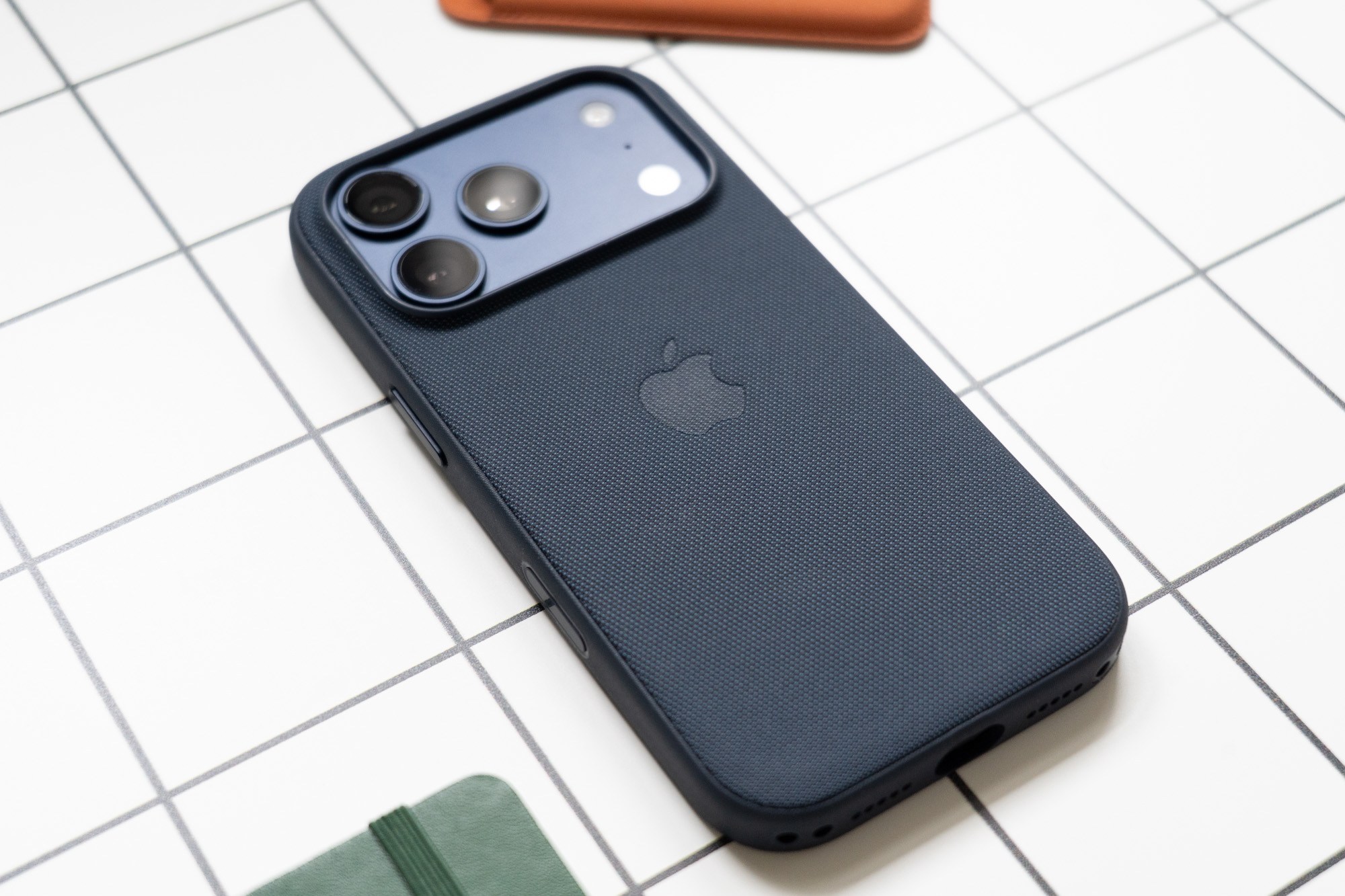 Blue iPhone 17 Pro in a TechWoven case